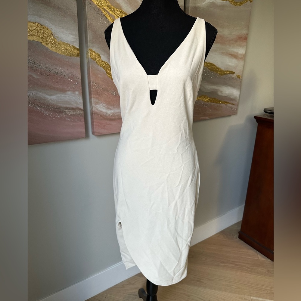 Dynamite White Body-con Dress with Asymmetric Hem and Cut Out